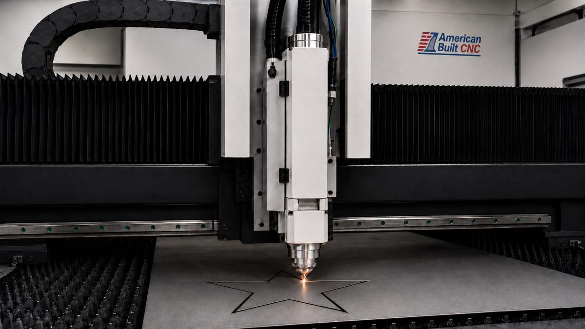 Fiber laser cutting head operating on sheet metal